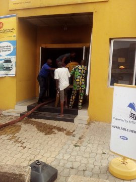 Nigerians set MTN office on fire in Lagos (photos)